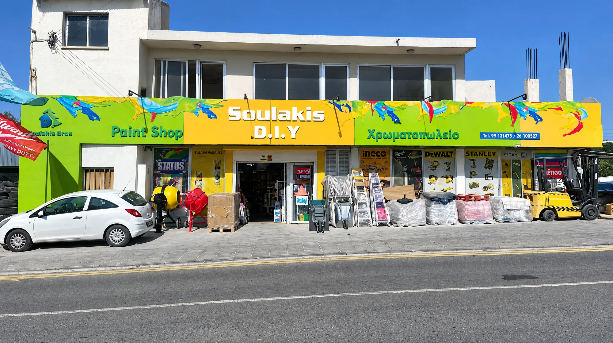 The bright green and yellow Soulakis DIY paint shop front on Alexandrou Ipsilanti